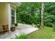 Outdoor patio area with potted plants, offering a serene space for relaxation and enjoying the natural surroundings at 1086 Erie Cir, Stone Mountain, GA 30087