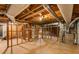 Unfinished basement showcasing exposed framing and ductwork at 2892 Guinevere Ne Dr, Atlanta, GA 30345