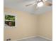 Bedroom featuring a ceiling fan, carpet, and window at 2892 Guinevere Ne Dr, Atlanta, GA 30345