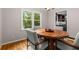 Charming dining room with natural light and a unique wood table, perfect for intimate gatherings at 2892 Guinevere Ne Dr, Atlanta, GA 30345