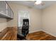 This office space includes built-in cabinets, a desk, and a ceiling fan at 2892 Guinevere Ne Dr, Atlanta, GA 30345