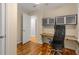 This home office space has built-in storage and a wood desk at 2892 Guinevere Ne Dr, Atlanta, GA 30345