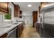 Modern kitchen featuring stainless steel appliances, custom cabinetry, and sleek countertops at 2892 Guinevere Ne Dr, Atlanta, GA 30345