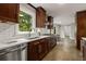 Updated kitchen with stainless appliances, white subway tile, and plenty of natural light at 2892 Guinevere Ne Dr, Atlanta, GA 30345