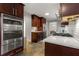 Modern kitchen featuring stainless steel appliances, custom cabinetry, and sleek countertops at 2892 Guinevere Ne Dr, Atlanta, GA 30345