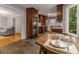 Eat-in kitchen featuring stainless steel appliances and plenty of counter space overlooking the living room at 2892 Guinevere Ne Dr, Atlanta, GA 30345