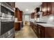 Modern kitchen featuring stainless steel appliances, custom cabinetry, and sleek countertops at 2892 Guinevere Ne Dr, Atlanta, GA 30345