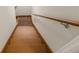 View of the wooden stairway featuring a handrail and leading to the upper or lower level of the home at 2892 Guinevere Ne Dr, Atlanta, GA 30345