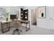 Bright home office featuring a modern desk, comfortable chair, and ample natural light at 3514 Ambassador Aly, Scottdale, GA 30079