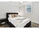Modern bedroom featuring neutral tones, plush bed, and a bright window allowing for plenty of natural light at 560 Morgan Ne St, Atlanta, GA 30308