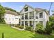 Stunning two-story home with a well-manicured lawn and charming curb appeal at 560 Morgan Ne St, Atlanta, GA 30308
