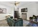 Living room with comfortable velvet green sofa, and built-in wine storage at 560 Morgan Ne St, Atlanta, GA 30308