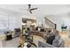 Bright and inviting living room with hardwood floors, a modern ceiling fan, and an open layout at 560 Morgan Ne St, Atlanta, GA 30308