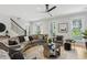 Elegant living room with a stylish sofa, modern decor, and abundant natural light exudes comfort and sophistication at 560 Morgan Ne St, Atlanta, GA 30308