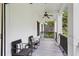 Inviting porch with comfortable seating, a ceiling fan, and a view of the surrounding neighborhood at 560 Morgan Ne St, Atlanta, GA 30308
