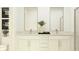 Bathroom featuring a double vanity, framed mirrors, and modern fixtures at 811 Atkins Ln, Woodstock, GA 30188
