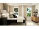 Bedroom with large windows, and hardwood flooring at 811 Atkins Ln, Woodstock, GA 30188