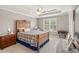 Bedroom boasts natural light, a ceiling fan, and ample space, creating a cozy and inviting atmosphere at 105 Pine Valley Ct, Hiram, GA 30141