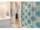Bathroom featuring a single sink vanity, with a toilet, and shower/tub combo in view at 316 Sierra Ct, Mcdonough, GA 30253
