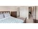 Bedroom features neutral walls, carpet flooring, with a closet and hall entrances at 316 Sierra Ct, Mcdonough, GA 30253