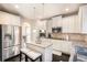 Spacious kitchen with stainless steel appliances, granite counters and island with seating at 316 Sierra Ct, Mcdonough, GA 30253