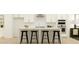 Modern kitchen island with seating and stainless steel appliances at 813 Atkins Ln, Woodstock, GA 30188