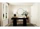 Office with modern desk, console, area rug and natural light at 813 Atkins Ln, Woodstock, GA 30188