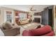 Inviting living room with a fireplace, plush seating, and lots of natural light at 154 Hunters Trl, Dallas, GA 30157