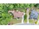 Expansive home featuring a private backyard oasis with a pool, patio, and lush landscaping at 103 Millstone Way, Canton, GA 30115