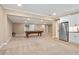 Spacious finished basement with a billiard table and kitchenette, offering ample room for recreation and entertaining at 103 Millstone Way, Canton, GA 30115