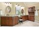 Bathroom featuring double vanity, granite counters, and custom cabinetry at 103 Millstone Way, Canton, GA 30115