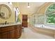 Bathroom featuring a double vanity, jacuzzi tub, and shower at 103 Millstone Way, Canton, GA 30115