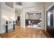 Spacious foyer showcasing hardwood floors, detailed trim work, and an open floor plan at 103 Millstone Way, Canton, GA 30115