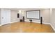 Home theater setup featuring a large screen and speaker system, great for entertaining or relaxing movie nights at 103 Millstone Way, Canton, GA 30115