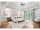 Spacious main bedroom featuring vaulted ceiling, hardwood floors, recessed lighting, and large windows at 103 Millstone Way, Canton, GA 30115
