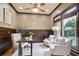 Cozy home office with wainscoting, natural light, and comfortable seating at 103 Millstone Way, Canton, GA 30115