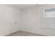 Bedroom with carpet flooring, a window with blinds, and a closet with double doors at 1204 Arnhem Dr, Hampton, GA 30228
