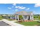 Exterior shot of the community clubhouse and pool area, with well-maintained landscaping at 1204 Arnhem Dr, Hampton, GA 30228