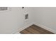 The laundry room has hardwood floors and all the water and electrical hookups you need at 1204 Arnhem Dr, Hampton, GA 30228