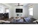 Relaxing living room with hardwood floors and modern amenities with a view of the kitchen bar at 1600 Donna Sw St, Mableton, GA 30126