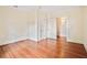 Spacious bedroom with hardwood floors and connecting doorways, offering a comfortable layout at 2056 Hosea L Williams Ne Dr, Atlanta, GA 30317