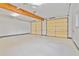 Spacious two-car garage with dual doors, clean white walls and ceiling, and ample open space at 2056 Hosea L Williams Ne Dr, Atlanta, GA 30317