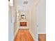 Hallway with hardwood floors, recessed lighting, and built-in shelving at 2056 Hosea L Williams Ne Dr, Atlanta, GA 30317