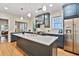 Modern kitchen with stainless steel appliances, island, and stylish cabinetry at 2056 Hosea L Williams Ne Dr, Atlanta, GA 30317