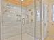 Spacious glass shower featuring dual shower heads, a niche, and a stylish tile design at 2056 Hosea L Williams Ne Dr, Atlanta, GA 30317