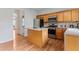 Well-equipped kitchen featuring an island, stainless steel appliances, and plenty of cabinet space at 8970 Ruel Ln, Suwanee, GA 30024