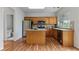 Bright kitchen featuring stainless steel appliances, a center island, and eat in dining at 8970 Ruel Ln, Suwanee, GA 30024