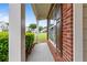 Inviting front porch with brick accents and view of a well-maintained neighborhood at 8970 Ruel Ln, Suwanee, GA 30024