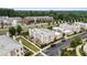 Aerial view of luxury townhome community with lush landscaping and convenient parking at 132 Grand Cres, Alpharetta, GA 30009