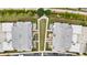 Aerial view of the luxury townhome community showcasing the manicured lawns and outdoor spaces at 132 Grand Cres, Alpharetta, GA 30009
